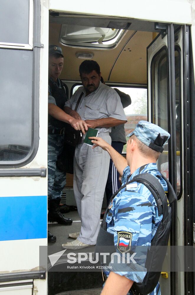 Police raid Moscow markets after attack on officers
