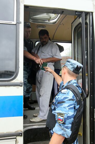 Police raid Moscow markets after attack on officers