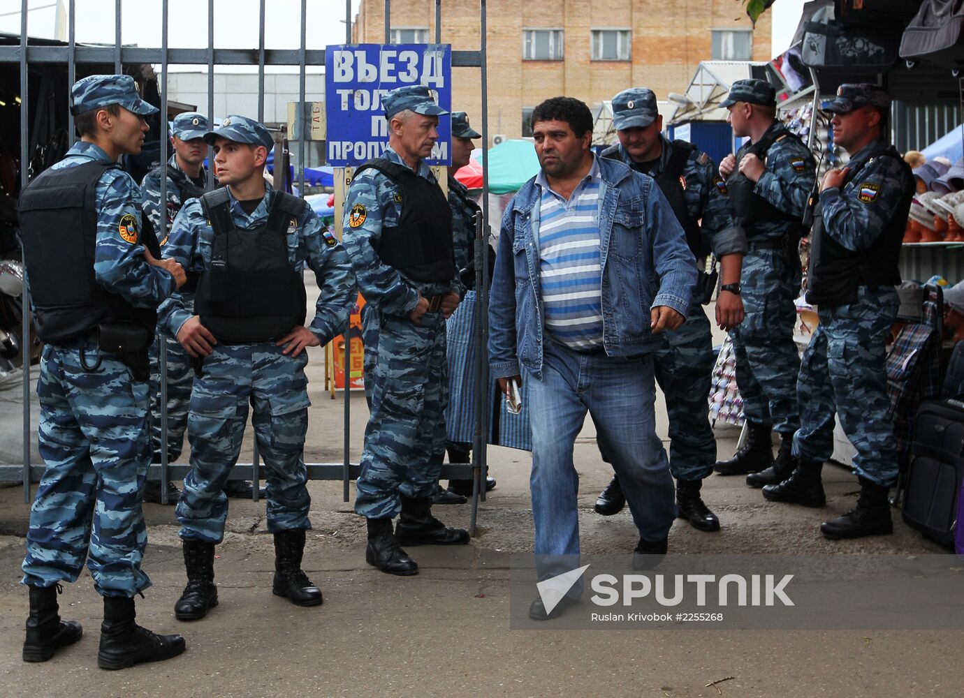 Police raid Moscow markets after attack on officers