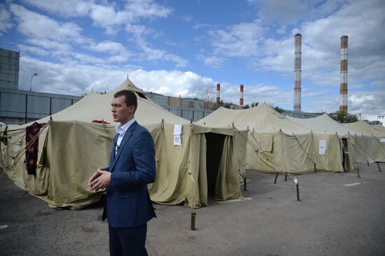 Mikhail Degtyarev visits camp for illegal migrants