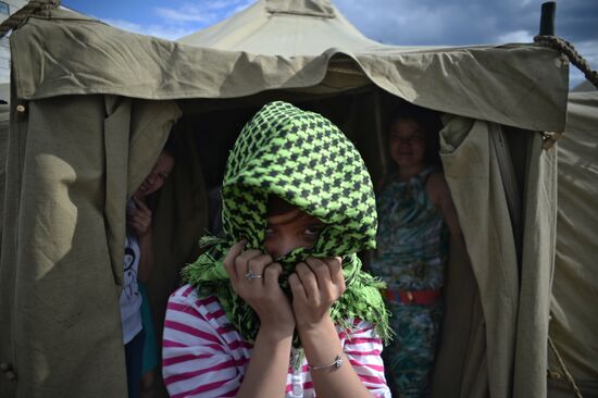 Mikhail Degtyarev visits camp for illegal migrants