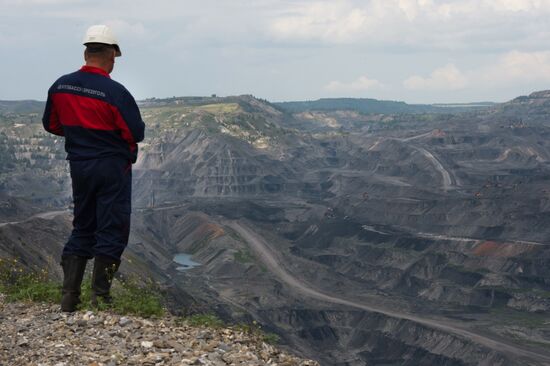 Mining coal at Bachatsky coal strip mine