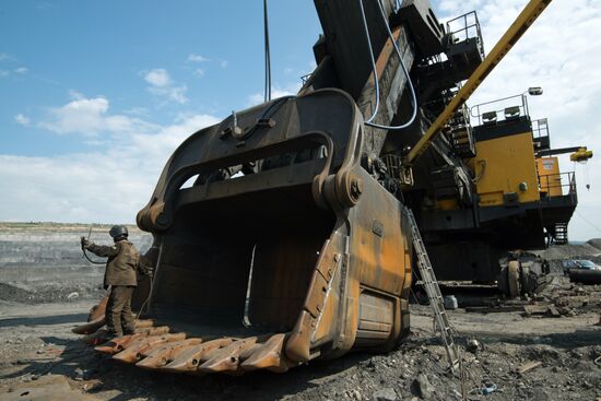 Mining coal at Bachatsky coal strip mine