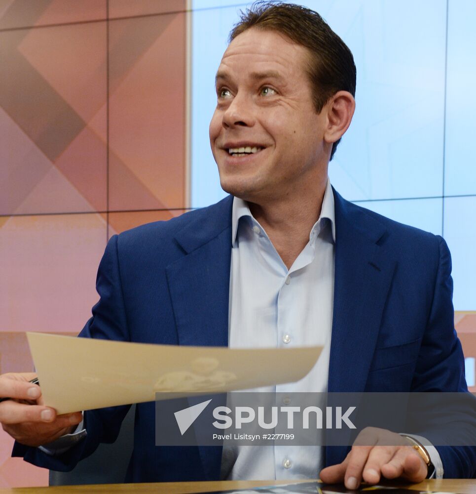 News conference by hockey player Pavel Bure at RIA Novosti