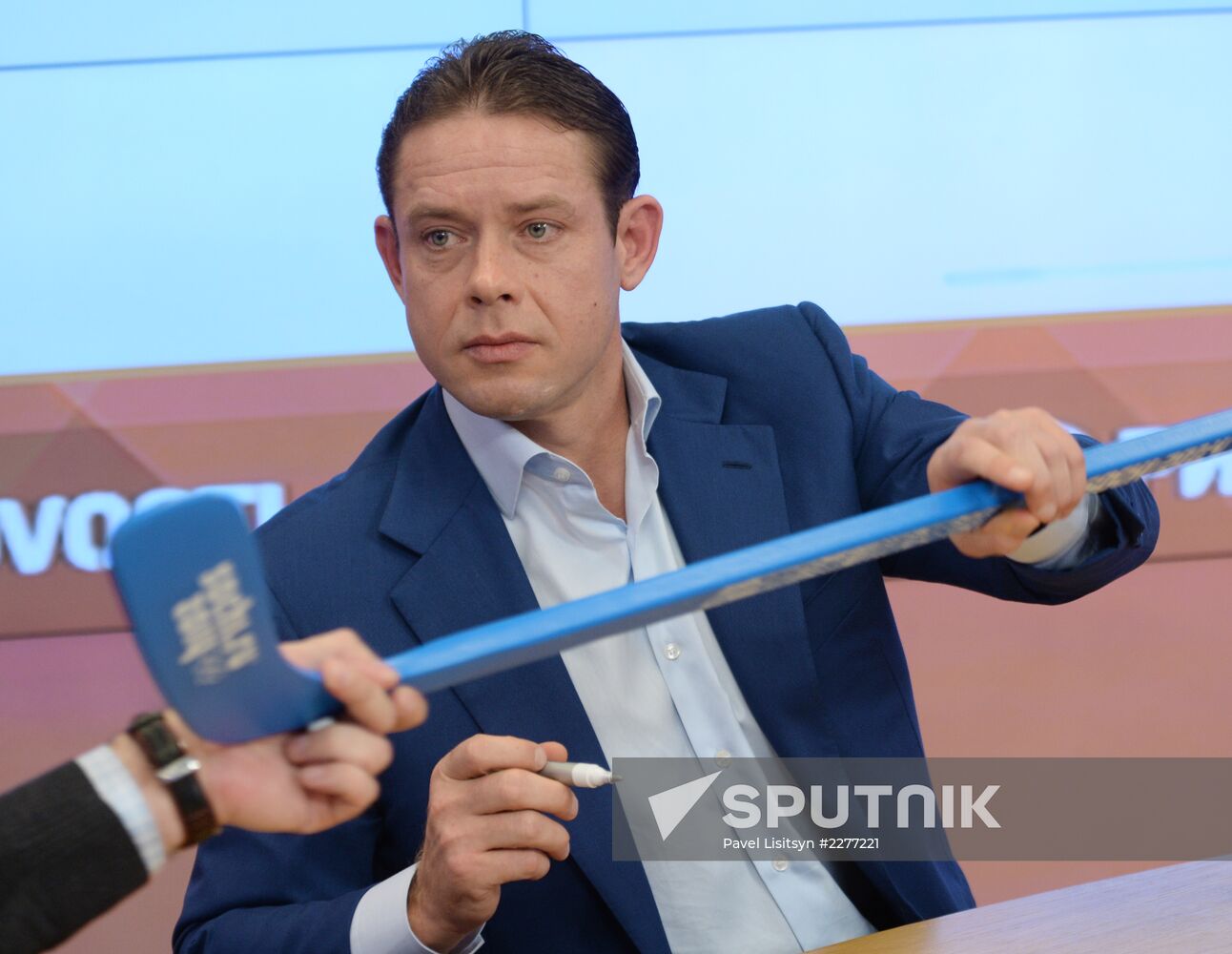 News conference by hockey player Pavel Bure at RIA Novosti