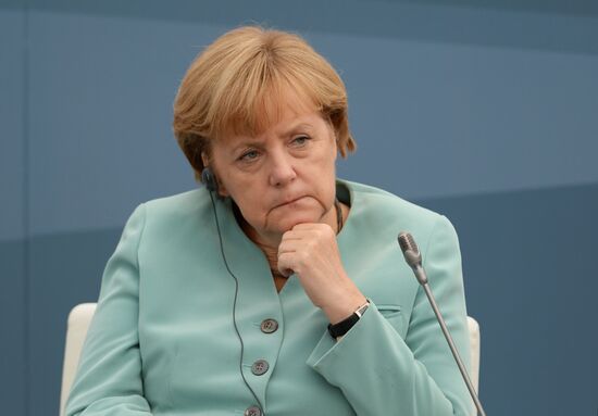 Vladimir Putin meets with Business 20 and Labour 20