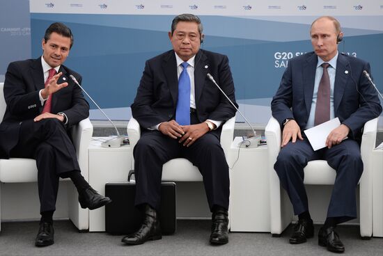 Vladimir Putin meets with Business 20 and Labour 20