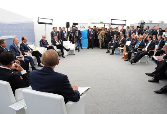 Vladimir Putin meets with Business 20 and Labour 20