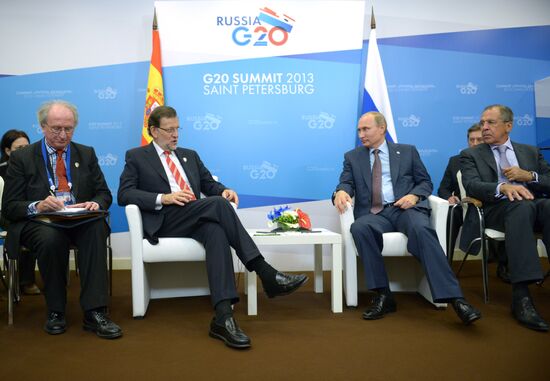 Vladimir Putin meets with Mariano Rajoy