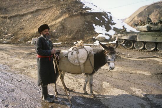 Tajik man with donkey