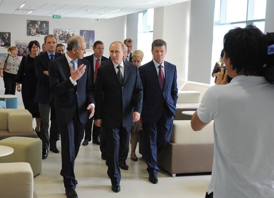 Vladimir Putin visits Russian International Olympic University