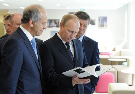 Vladimir Putin visits Russian International Olympic University