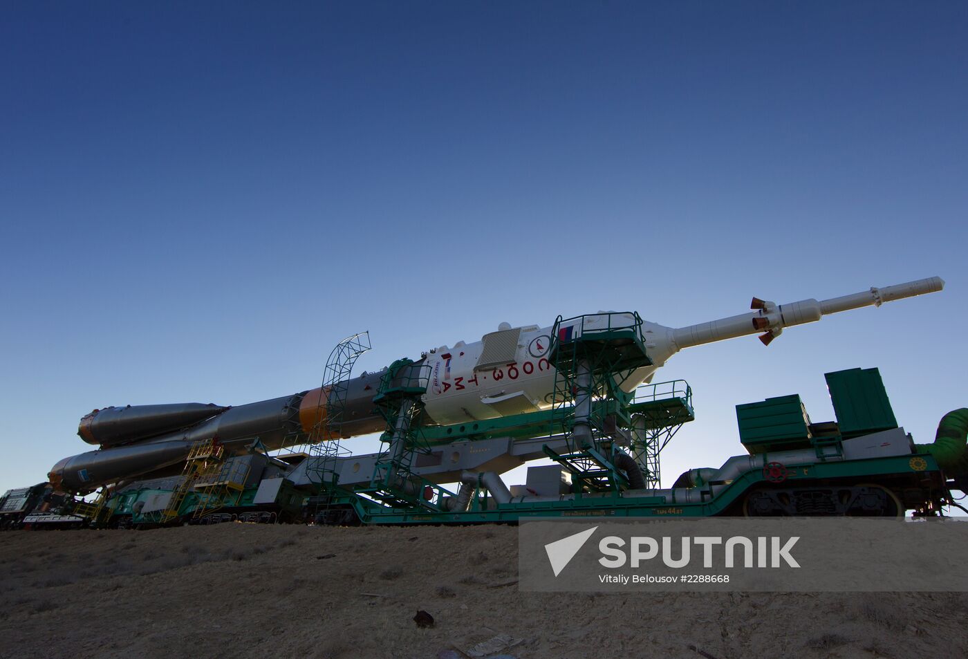 Soyuz FG rocket with Soyuz TMA-10M spacecraft rolled out to pad