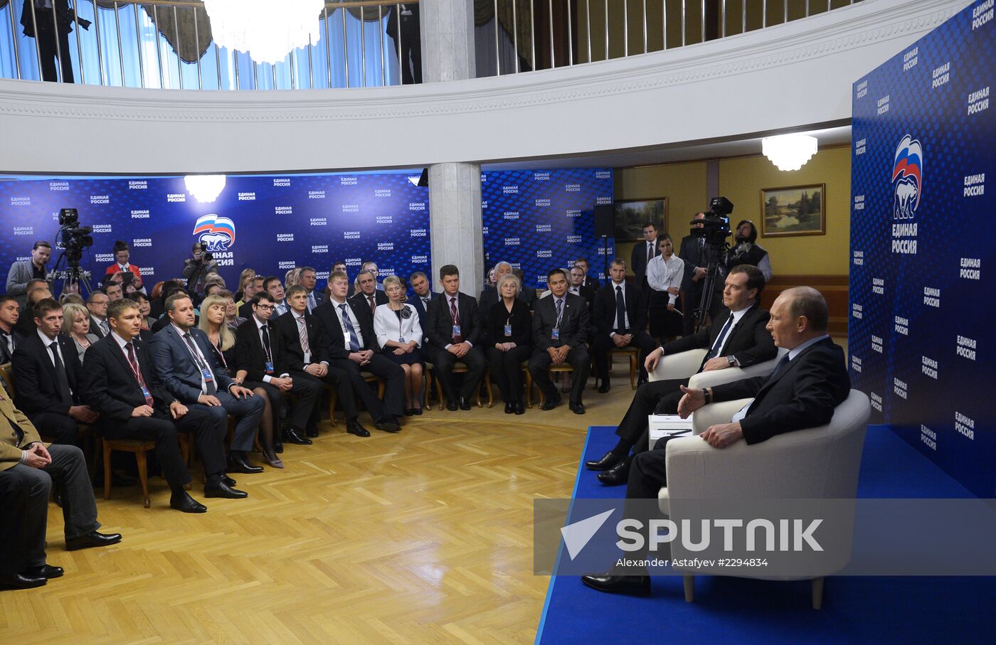 Putin, Medvedev meet with United Russia Party activits
