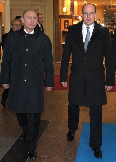 Vladimir Putin and Prince Albert II of Monaco visit Olympic Torch Exhibition