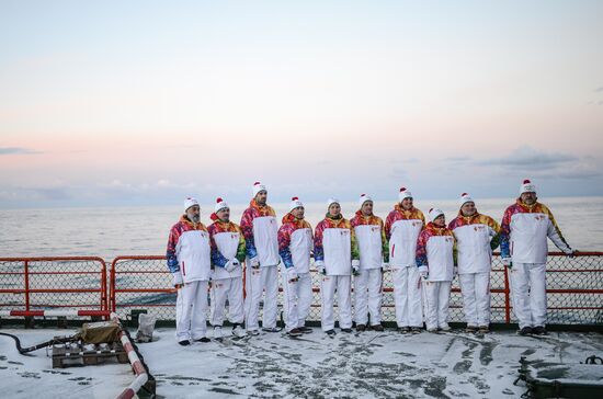 Participants in the Olympic Torch Relay at North Pole