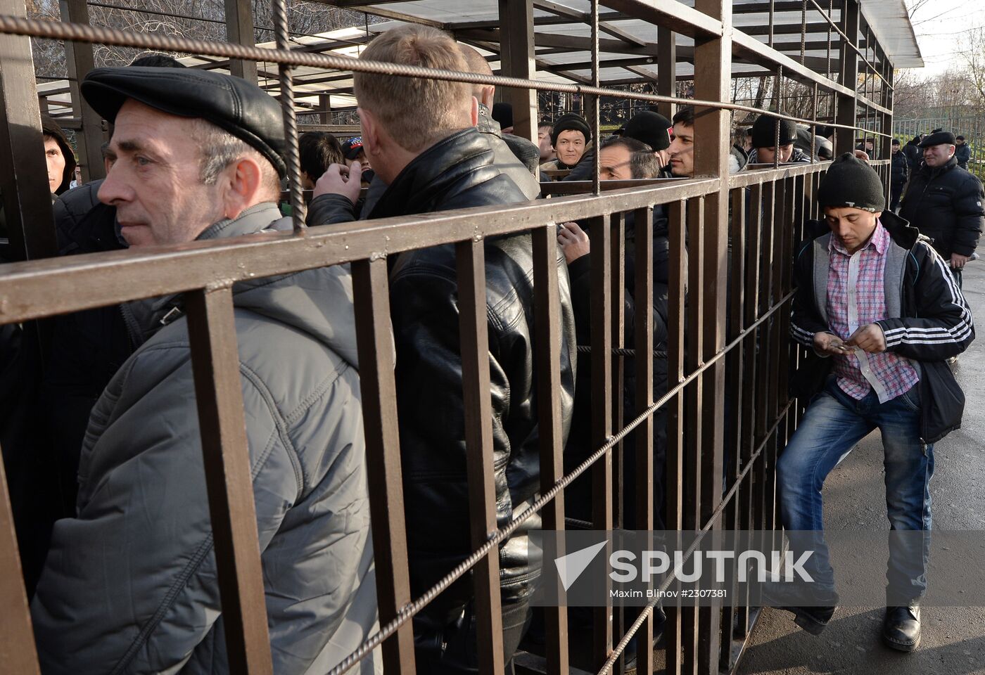 Immigrants in line to Federal Migration Service Moscow Department