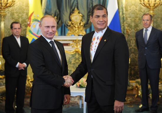 Vladimir Putin holds talks with Rafael Correa