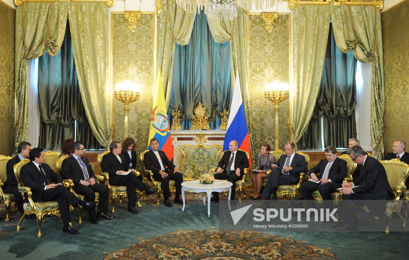 Vladimir Putin holds talks with Rafael Correa