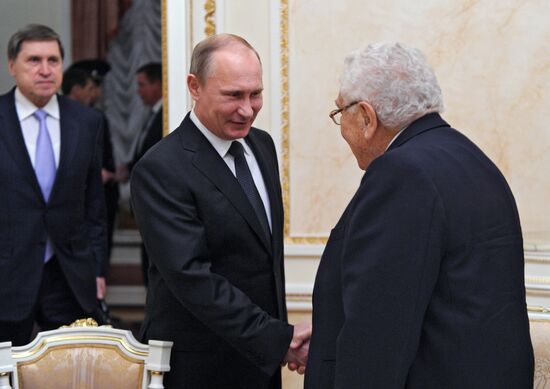 Vladimir Putin meets with Henry Kissinger