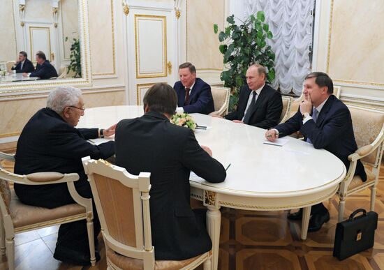 Vladimir Putin meets with Henry Kissinger
