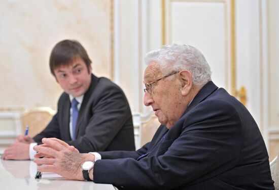Vladimir Putin meets with Henry Kissinger