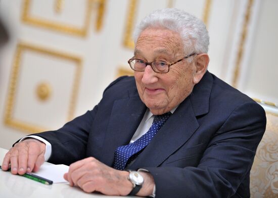 Vladimir Putin meets with Henry Kissinger