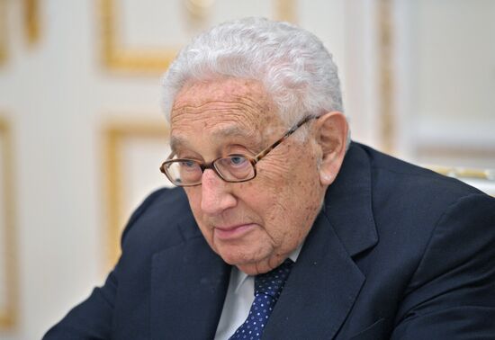 Vladimir Putin meets with Henry Kissinger
