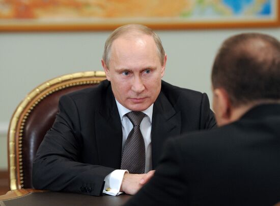 Vladimir Putin meets with Mikhail Men