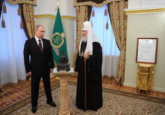 Vladimir Putin receives award from World Russian People's Council