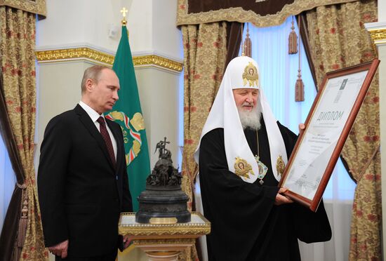 Vladimir Putin receives award from World Russian People's Council