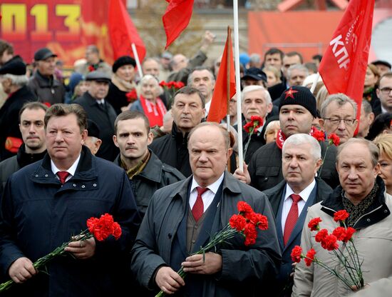 Laying flowers to Lenin Mausoleum on Red Square