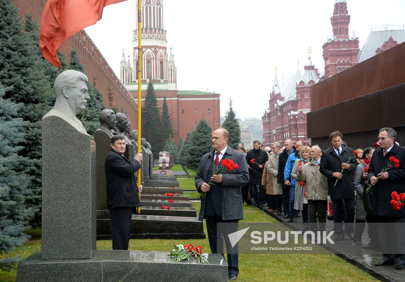 Laying flowers to Lenin Mausoleum on Red Square