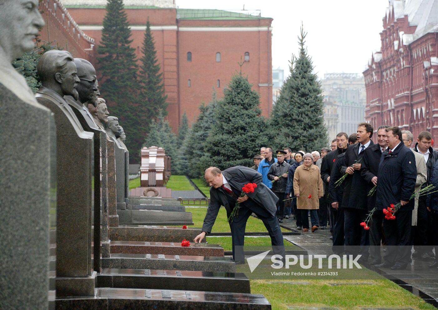 Laying flowers to Lenin Mausoleum on Red Square