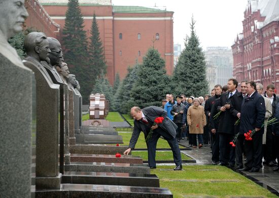 Laying flowers to Lenin Mausoleum on Red Square