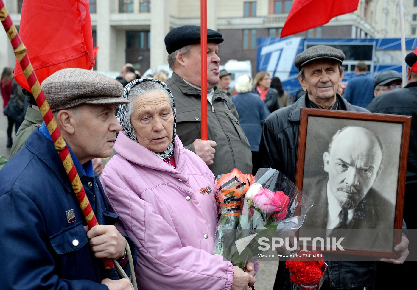 Laying flowers to Lenin Mausoleum on Red Square