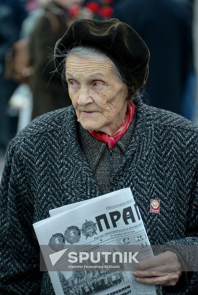 Laying flowers to Lenin Mausoleum on Red Square