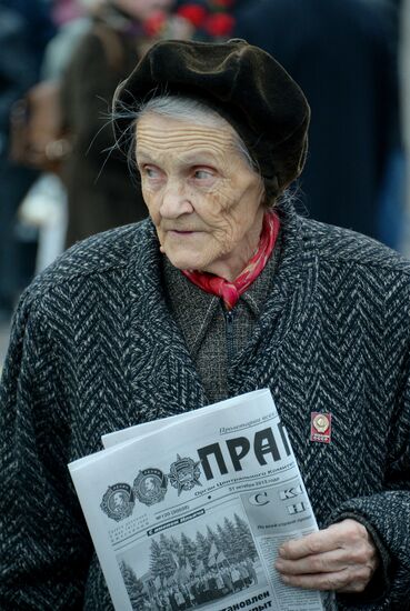 Laying flowers to Lenin Mausoleum on Red Square