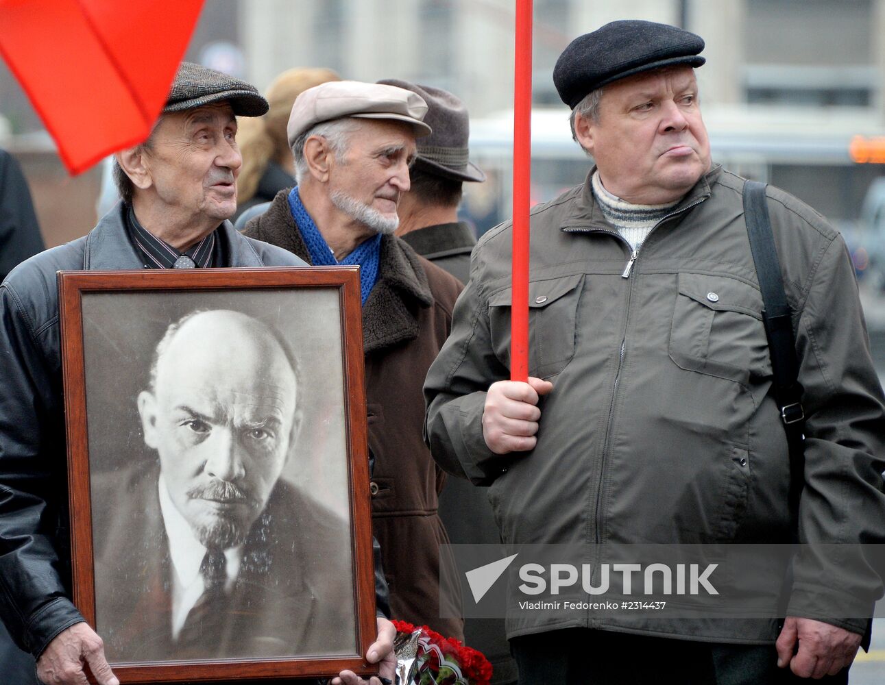 Laying flowers to Lenin Mausoleum on Red Square