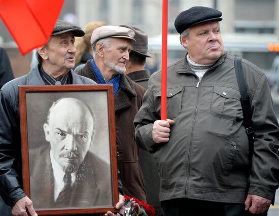 Laying flowers to Lenin Mausoleum on Red Square