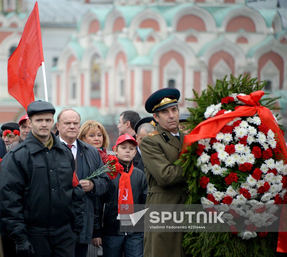 Laying flowers to Lenin Mausoleum on Red Square