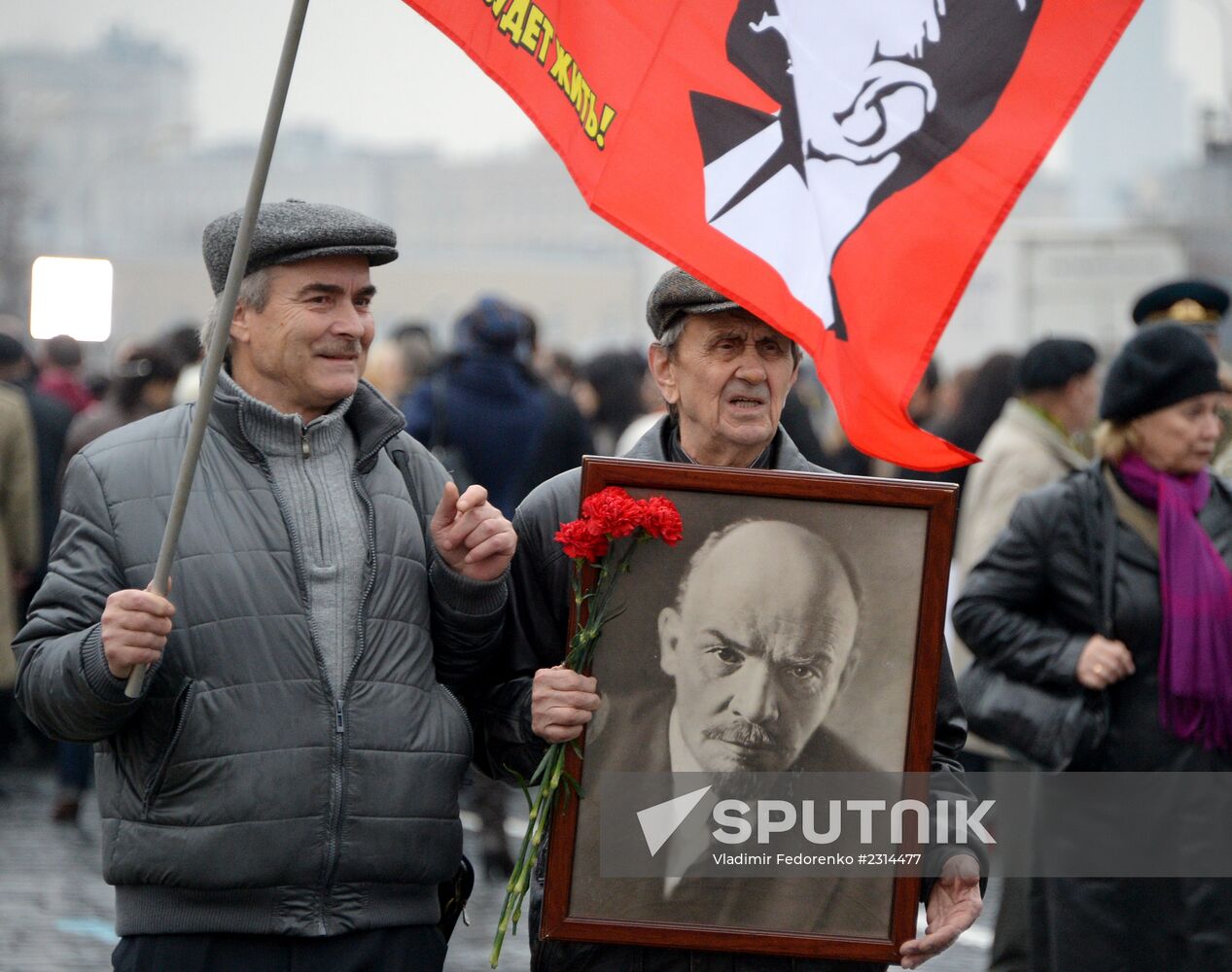 Laying flowers to Lenin Mausoleum on Red Square
