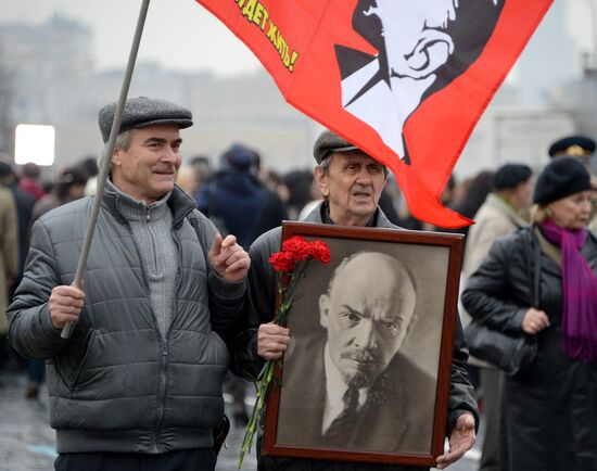 Laying flowers to Lenin Mausoleum on Red Square