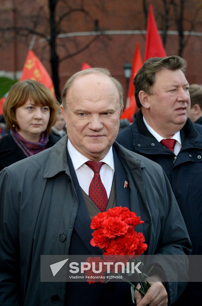 Laying flowers to Lenin Mausoleum on Red Square