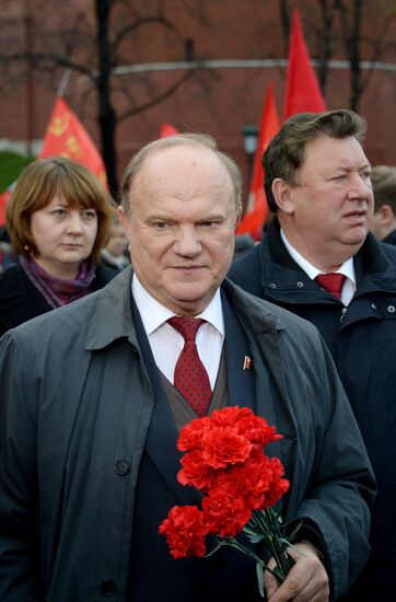 Laying flowers to Lenin Mausoleum on Red Square