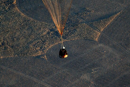 ISS capsule carries Olympic torch to Earth