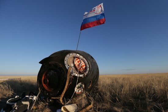 ISS capsule carries Olympic torch to Earth