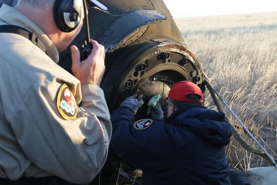 ISS capsule carries Olympic torch to Earth