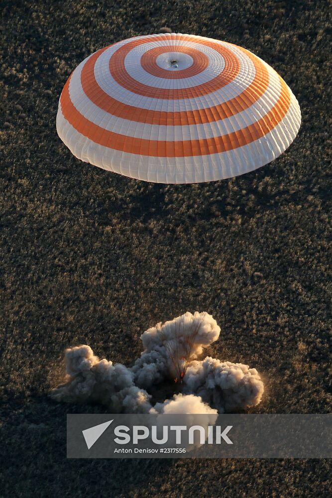 ISS capsule carries Olympic torch to Earth