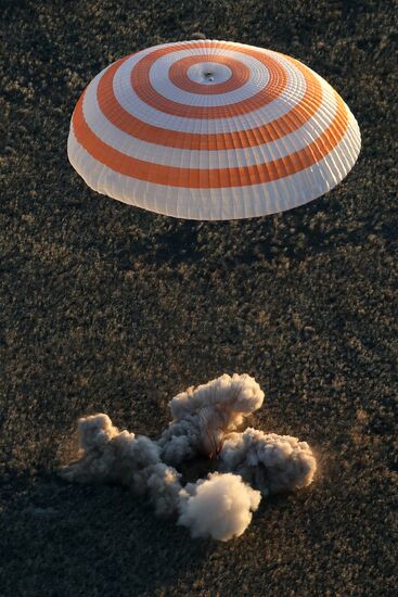 ISS capsule carries Olympic torch to Earth